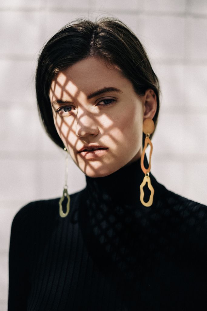 Gold chain earrings with model