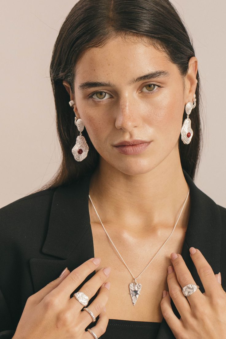 Earrings and necklace with model
